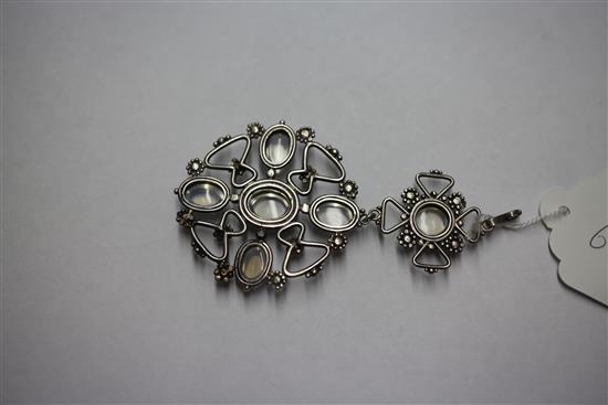 An early 20th century Arts & Crafts silver and moonstone drop pendant, overall 3.75in.